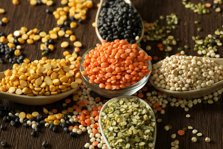 Variety,Of,Lentils,Kept,On,Wooden,Background
